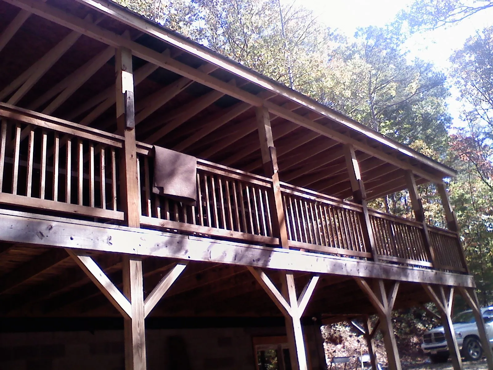 Timber framing under a new elevated porch and deck — Roof Leak Repair in Deerfield Beach by Roofing Brothers